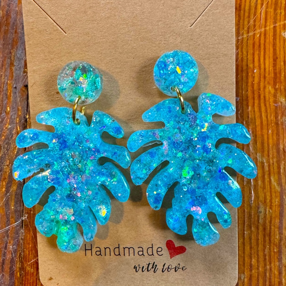 Blue sparkly palm leaf earrings!